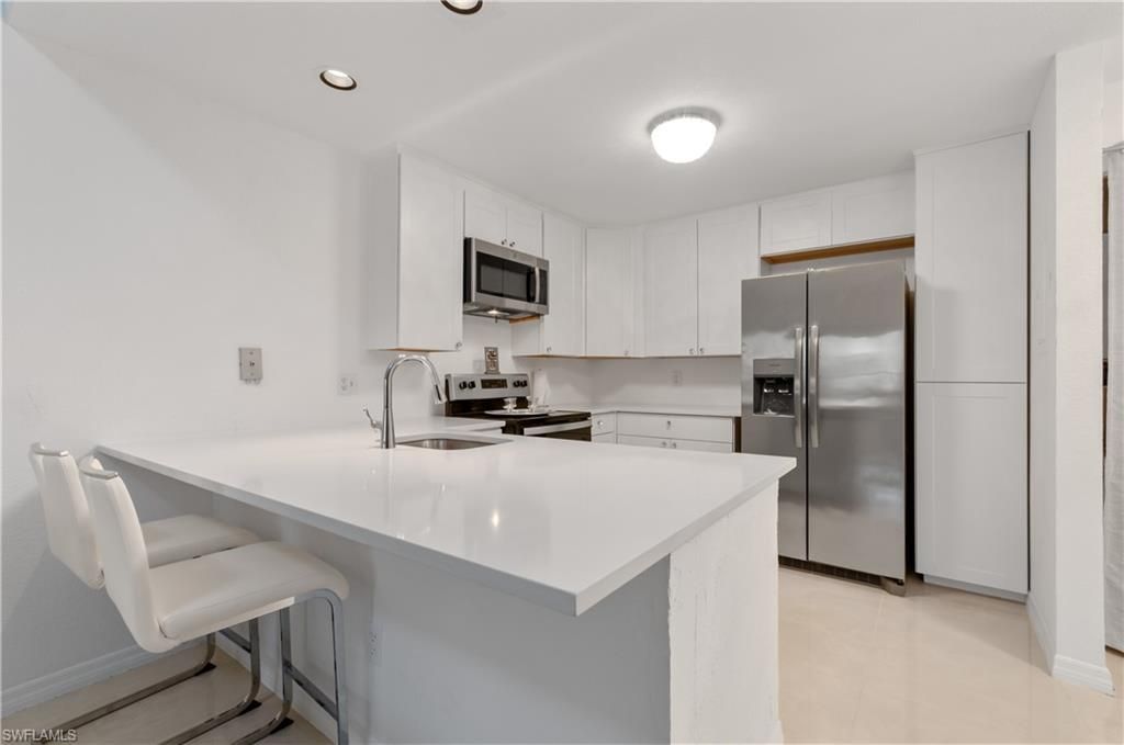 79 Emerald Woods Dr, Unit J10, Naples, FL 34108 Photo