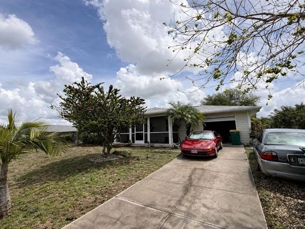 913 TROPICAL CIRCLE NW, PORT CHARLOTTE, FL 33948