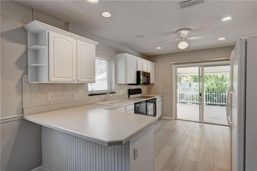 7743 W Country Club Boulevard, Boca Raton, FL 33487 Photo