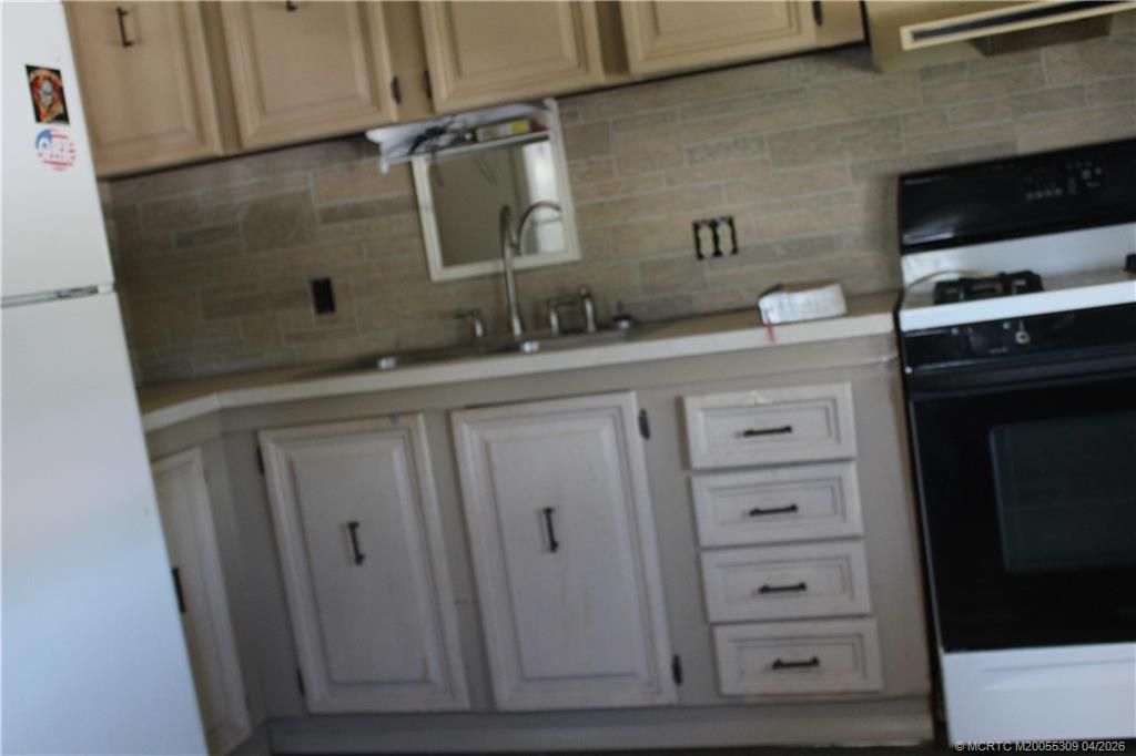 345 NE Tropicalia Lane, Jensen Beach, FL 34957 Photo