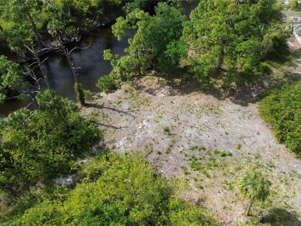 7711 COSMO COURT , PORT CHARLOTTE, FL 33981