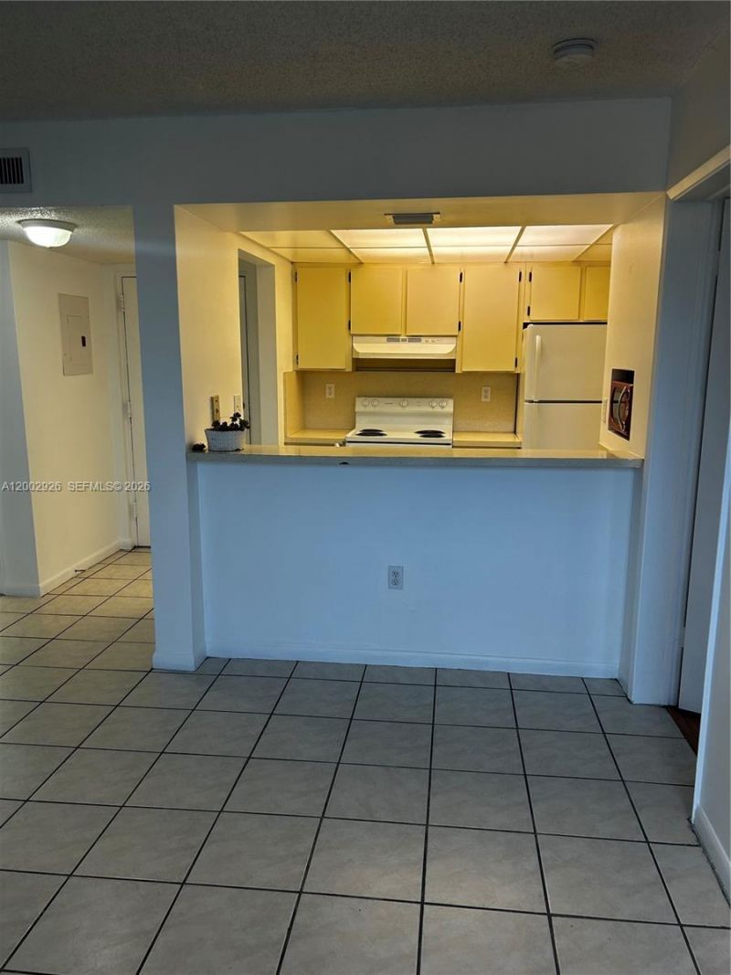 6955 NW 186th St, Unit F407, Hialeah, FL 33015 Photo