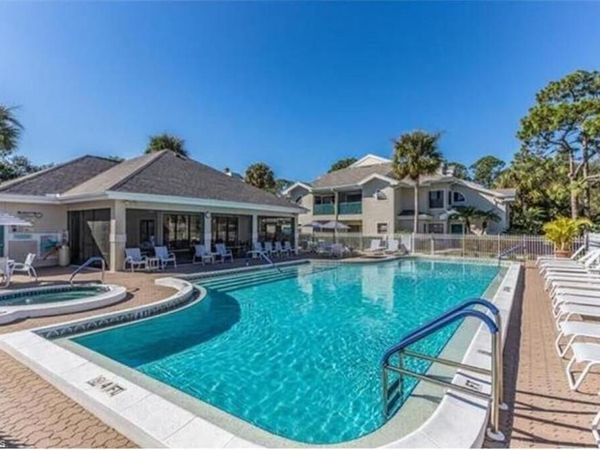 65 Emerald Woods DR , Unit E8, NAPLES, FL 34108