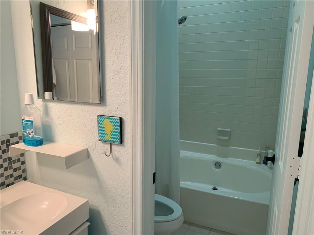 65 Emerald Woods Dr, Unit E8, Naples, FL 34108 Photo