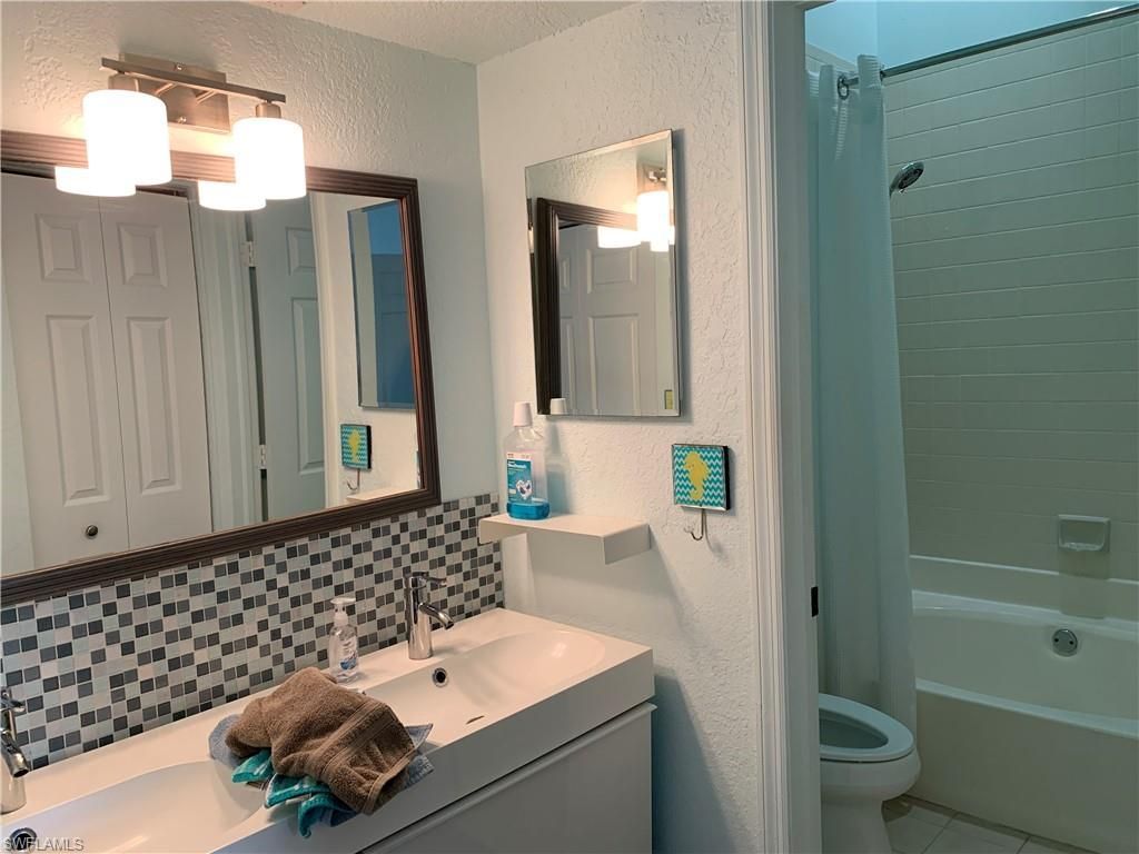 65 Emerald Woods Dr, Unit E8, Naples, FL 34108 Photo