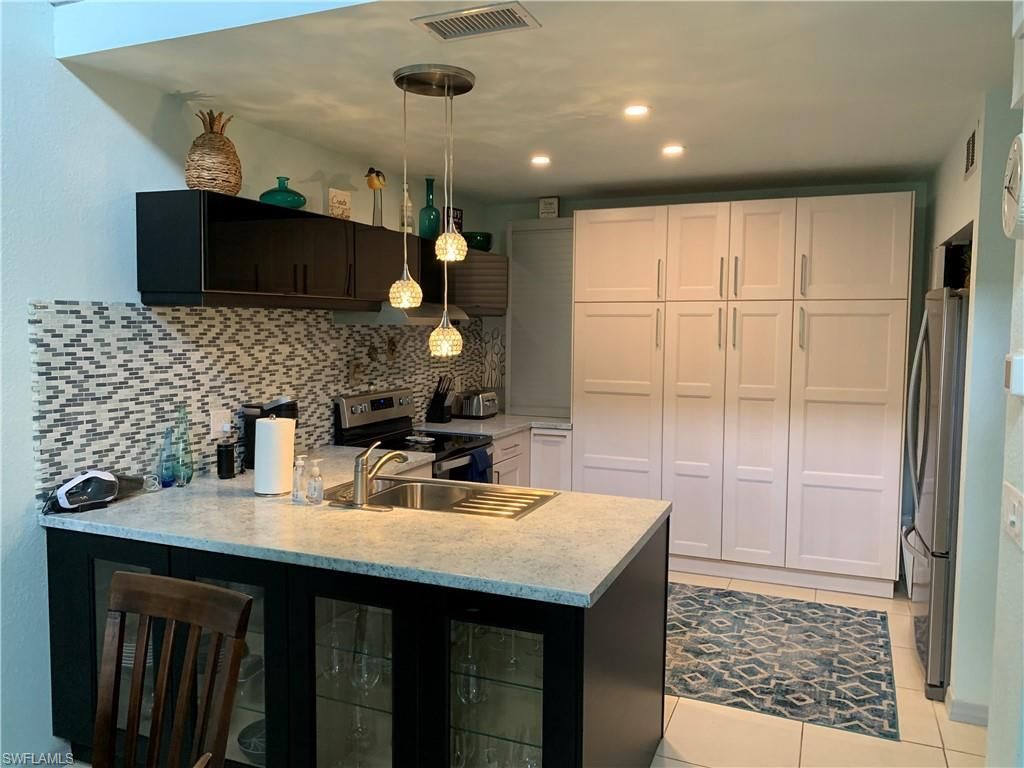 65 Emerald Woods Dr, Unit E8, Naples, FL 34108 Photo