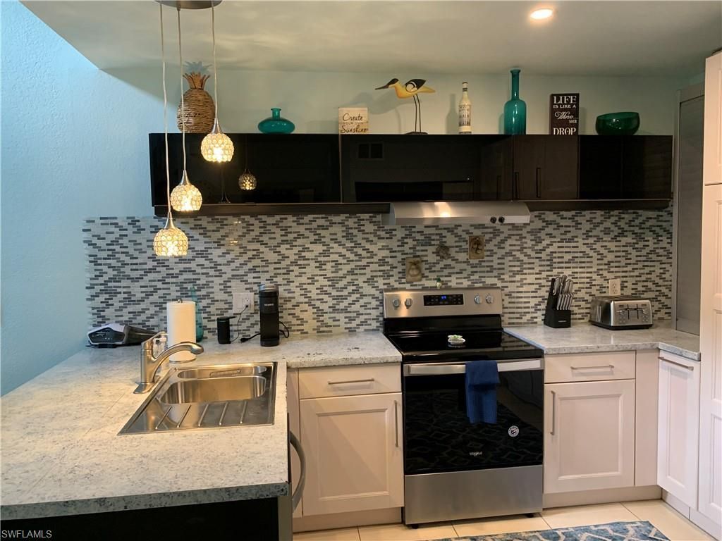 65 Emerald Woods Dr, Unit E8, Naples, FL 34108 Photo