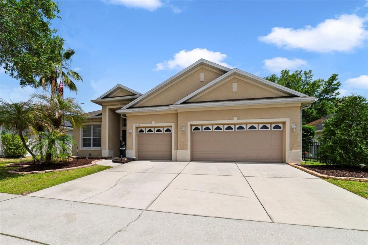 6695 Lake Carlisle Boulevard , Orlando, FL 32829 Photo