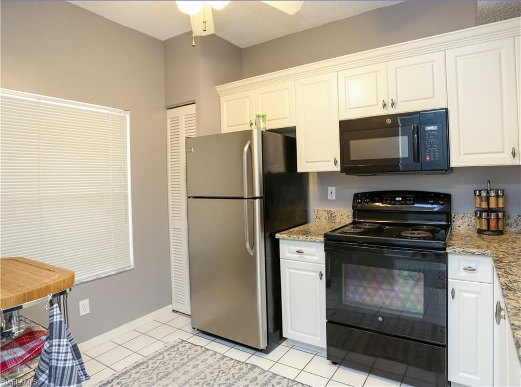 1044 Woodshire Ln, Unit B203, Naples, FL 34105 Photo