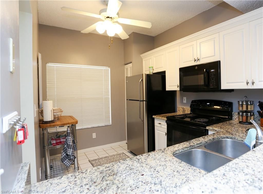 1044 Woodshire Ln, Unit B203, Naples, FL 34105 Photo