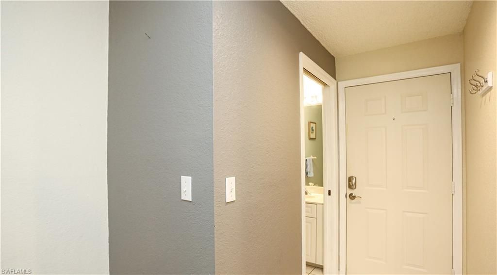 1044 Woodshire Ln, Unit B203, Naples, FL 34105 Photo