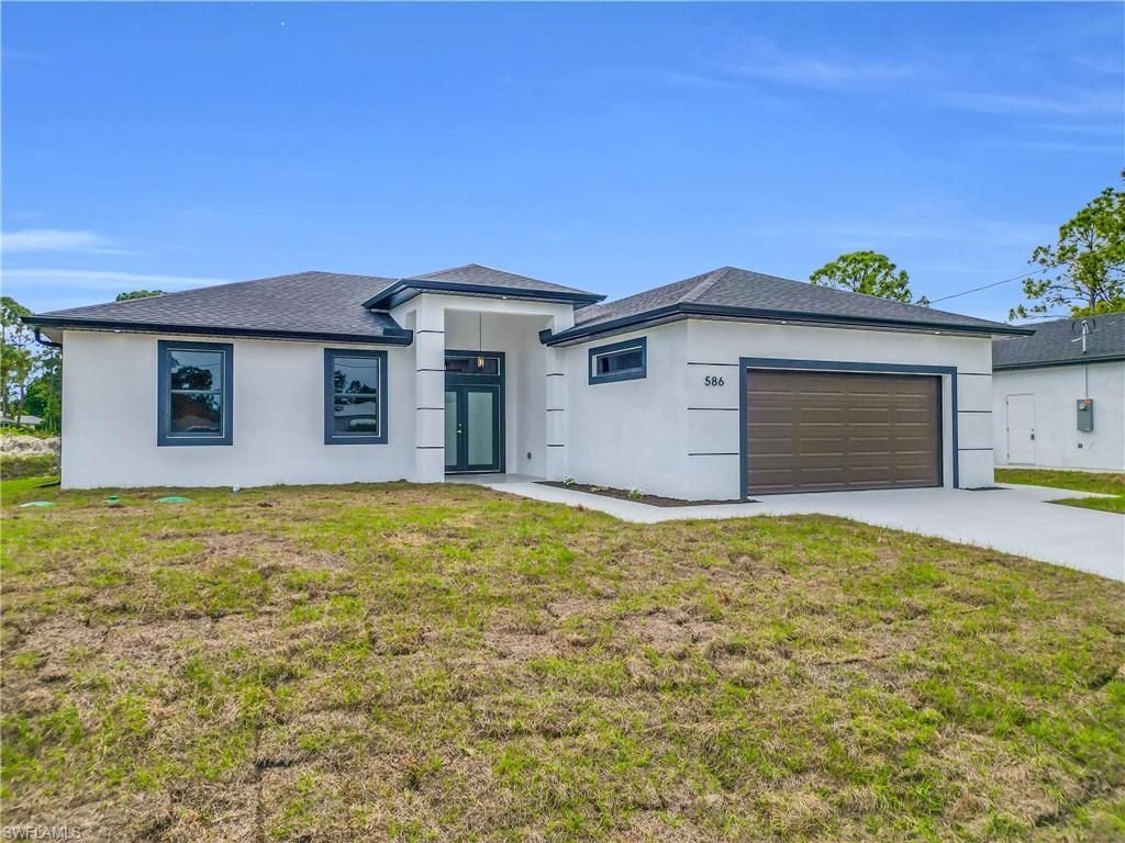 586 Genoa Ave S, Lehigh Acres, FL 33974 Photo