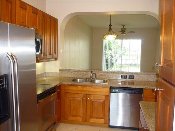 3500 Oaks Clubhouse Drive, Pompano Beach, FL 33069