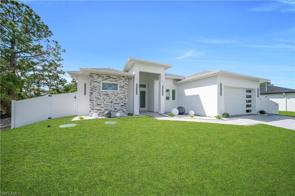 2703 34th St Sw, Lehigh Acres, FL 33976 Photo