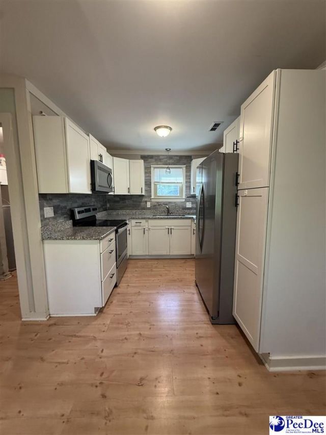 909 Sheridan Oliver Rd Photo 8