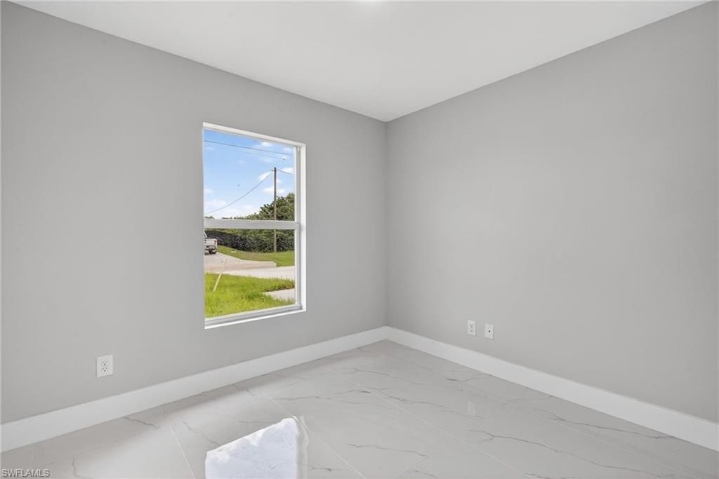 704 Carbon St E, Lehigh Acres, FL 33974 Photo