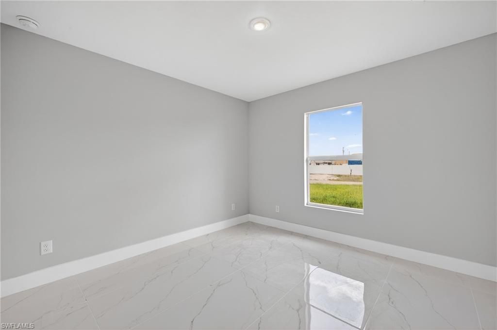 704 Carbon St E, Lehigh Acres, FL 33974 Photo
