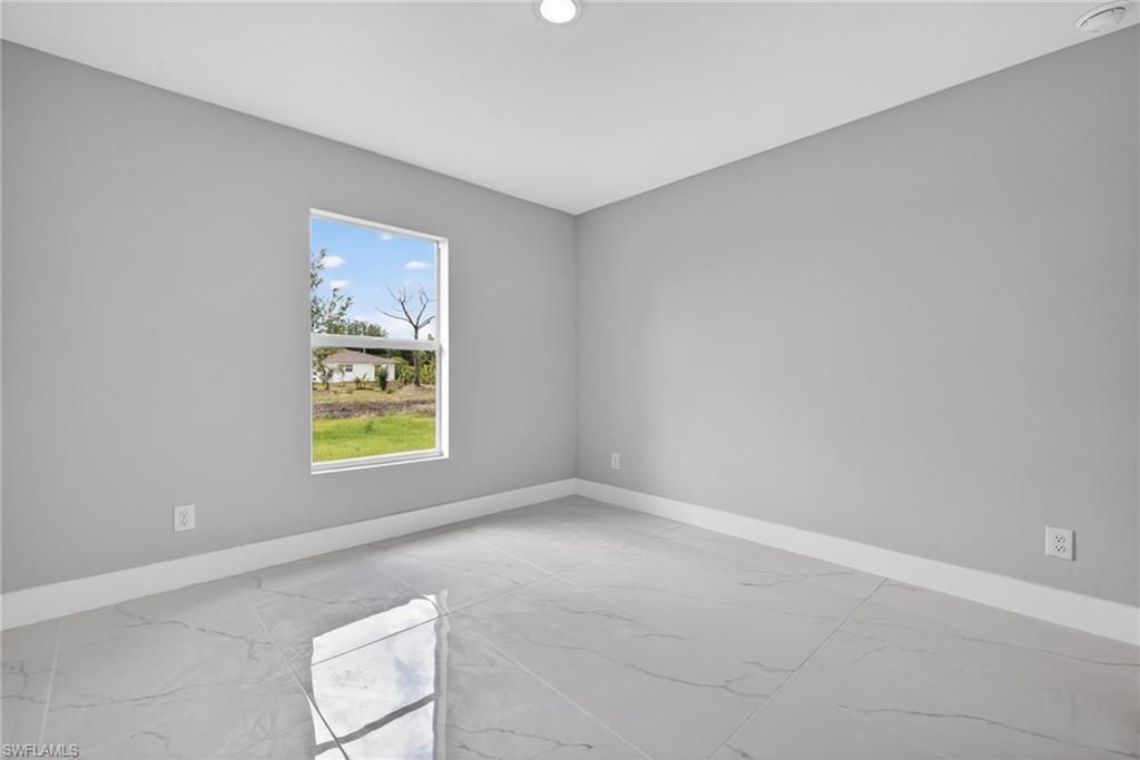 704 Carbon St E, Lehigh Acres, FL 33974 Photo
