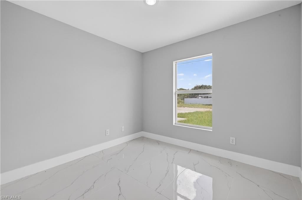 702 Carbon St E, Lehigh Acres, FL 33974 Photo