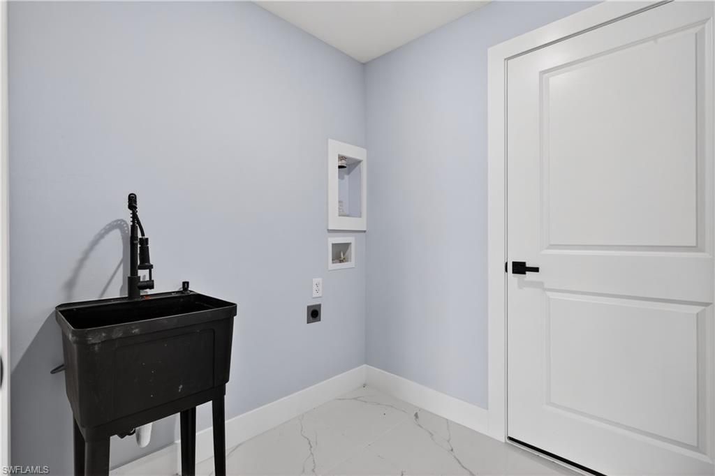 702 Carbon St E, Lehigh Acres, FL 33974 Photo