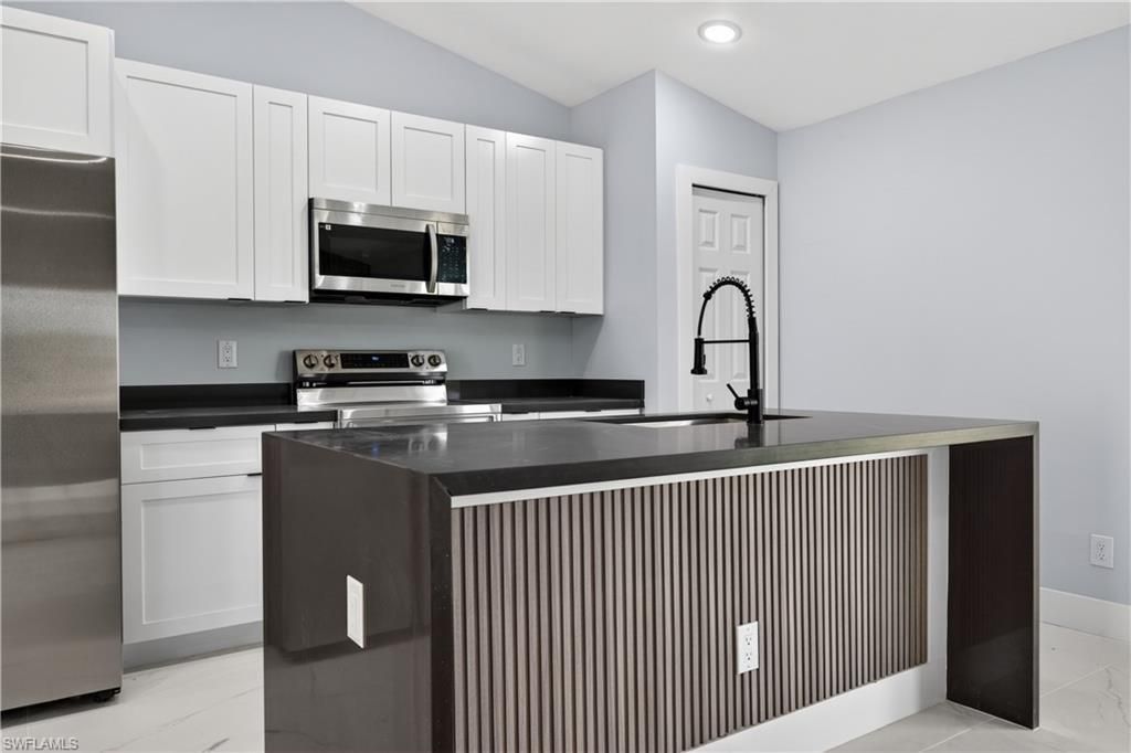702 Carbon St E, Lehigh Acres, FL 33974 Photo