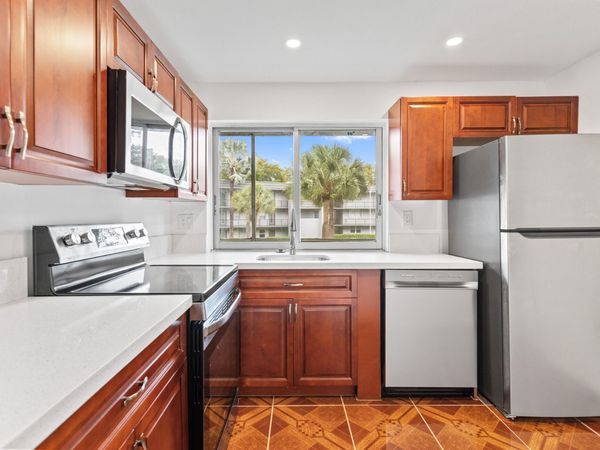 9091 Lime Bay Boulevard, Unit 210, Tamarac, FL 33321