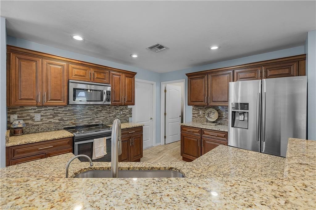 3928 NW 41st Pl, Cape Coral, FL 33993 Photo