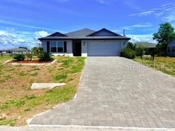 2123 NE 6TH AVENUE, CAPE CORAL, FL 33909