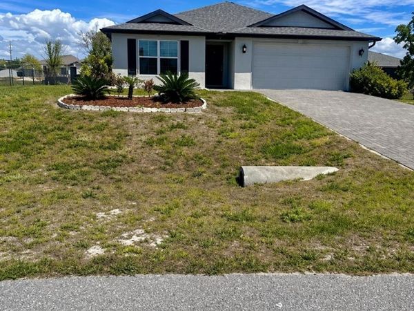 2123 NE 6TH AVENUE, CAPE CORAL, FL 33909