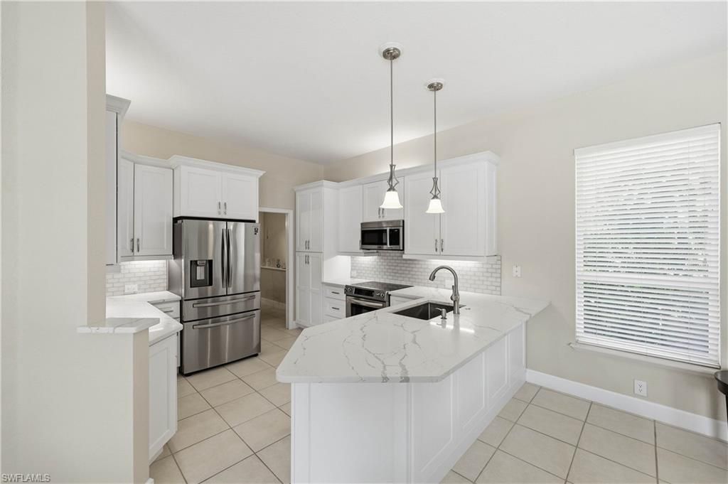 9227 Troon Lakes Dr, Naples, FL 34109 Photo