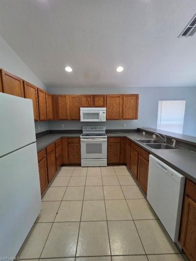332 Rogen St , Lehigh Acres, FL 33972 Photo