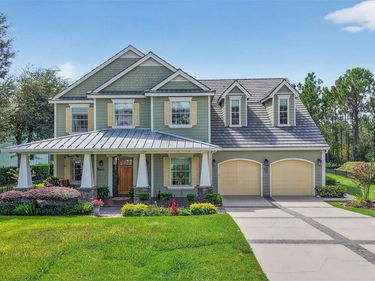 404 LONG AND WINDING ROAD, HOWEY IN THE HILLS, FL 34737