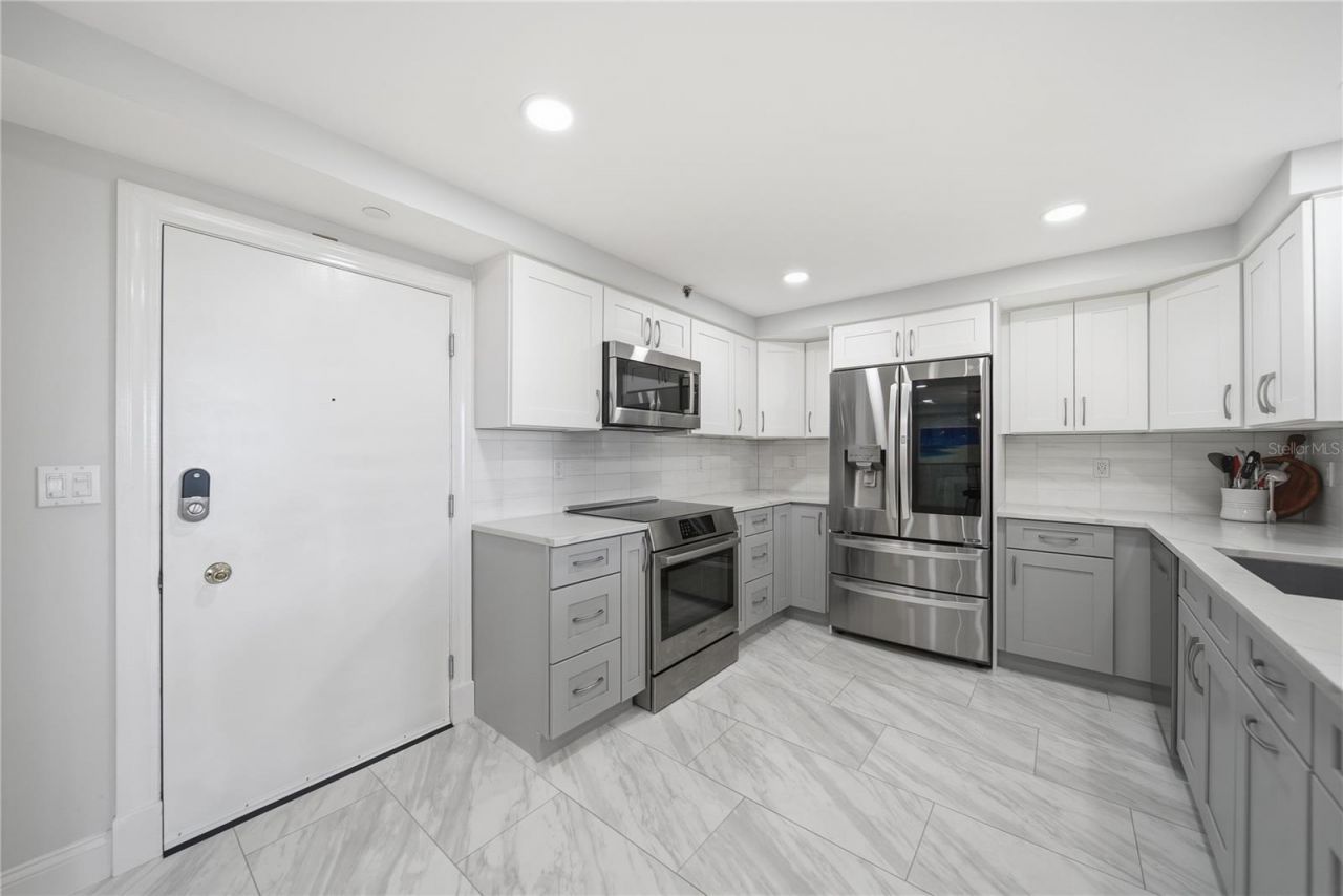 1 Key Capri, Unit 306E, Treasure Island, FL 33706 Photo