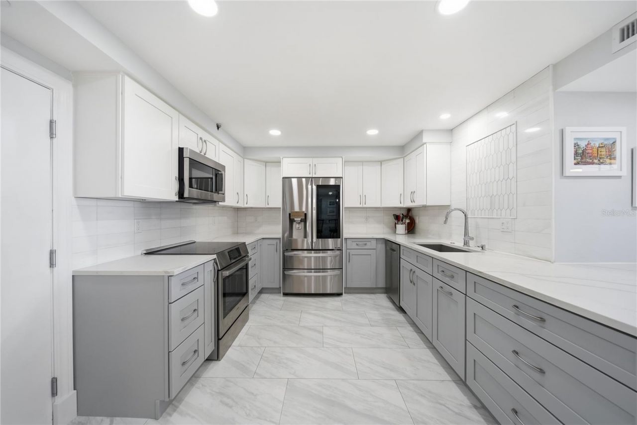 1 Key Capri, Unit 306E, Treasure Island, FL 33706 Photo
