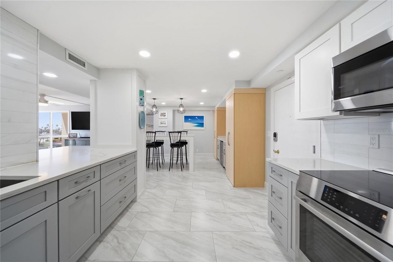 1 Key Capri, Unit 306E, Treasure Island, FL 33706 Photo