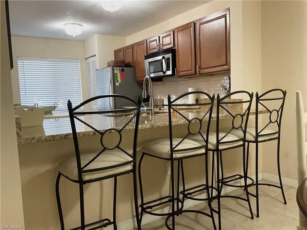 3062 Sandpiper Bay Cir, Unit K102, Naples, FL 34112 Photo