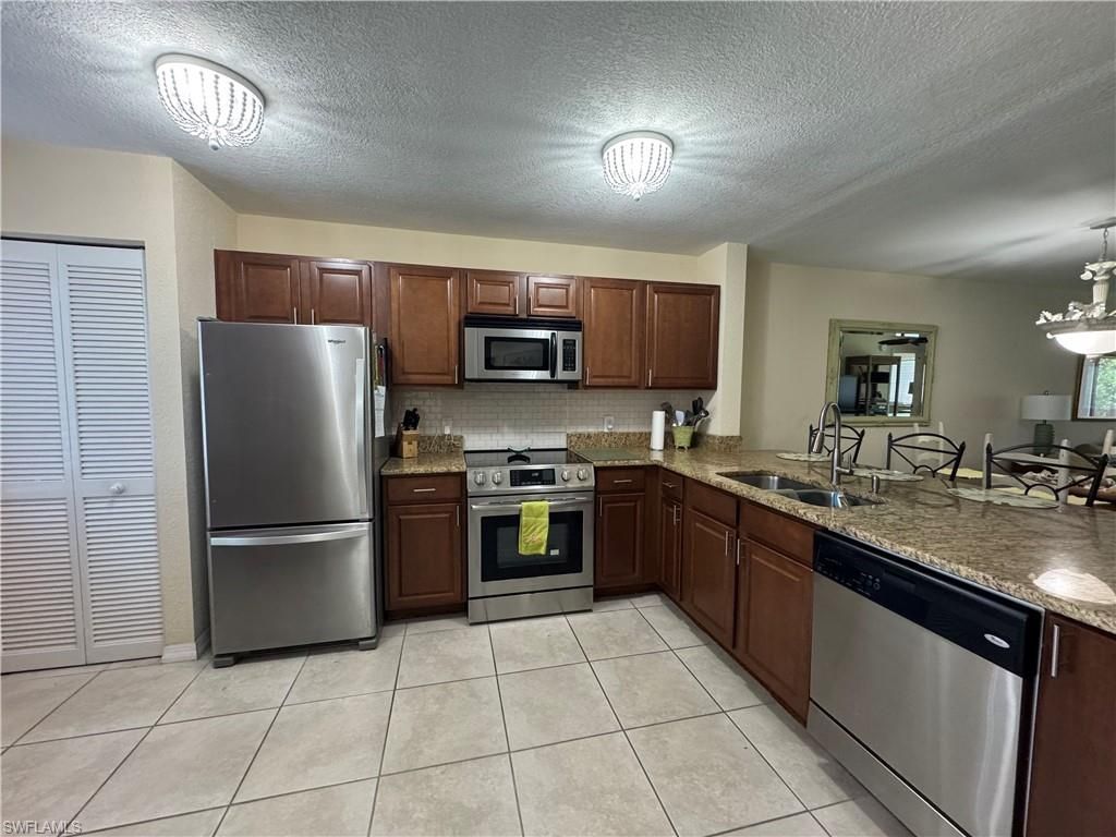 3062 Sandpiper Bay Cir, Unit K102, Naples, FL 34112 Photo