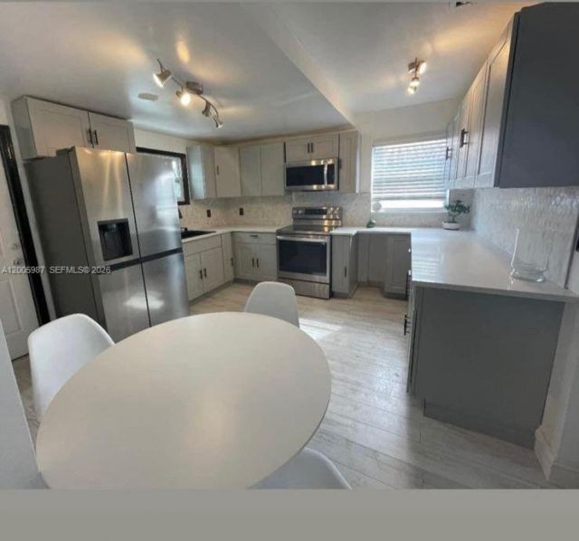 311 NW 32nd Ct , Miami, FL 33125 Photo
