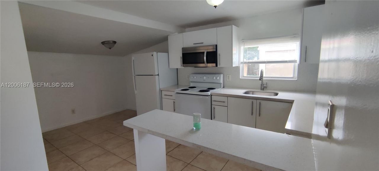 2103 NW 57th St , Miami, FL 33142 Photo