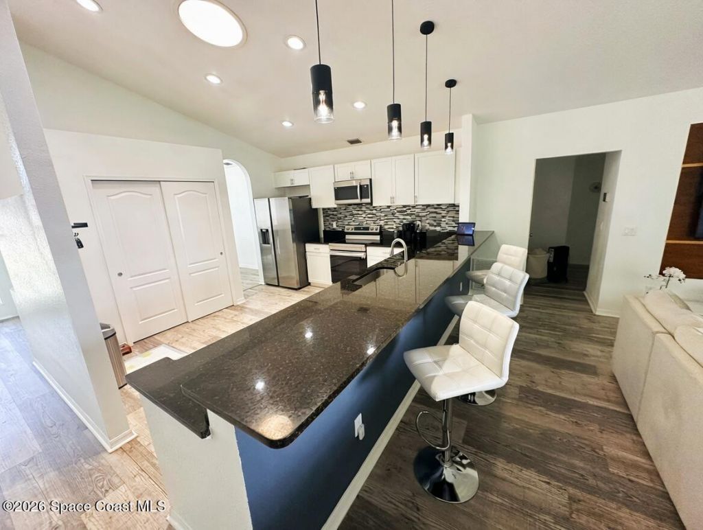 704 Carriage Hill Road, Melbourne, FL 32940 Photo