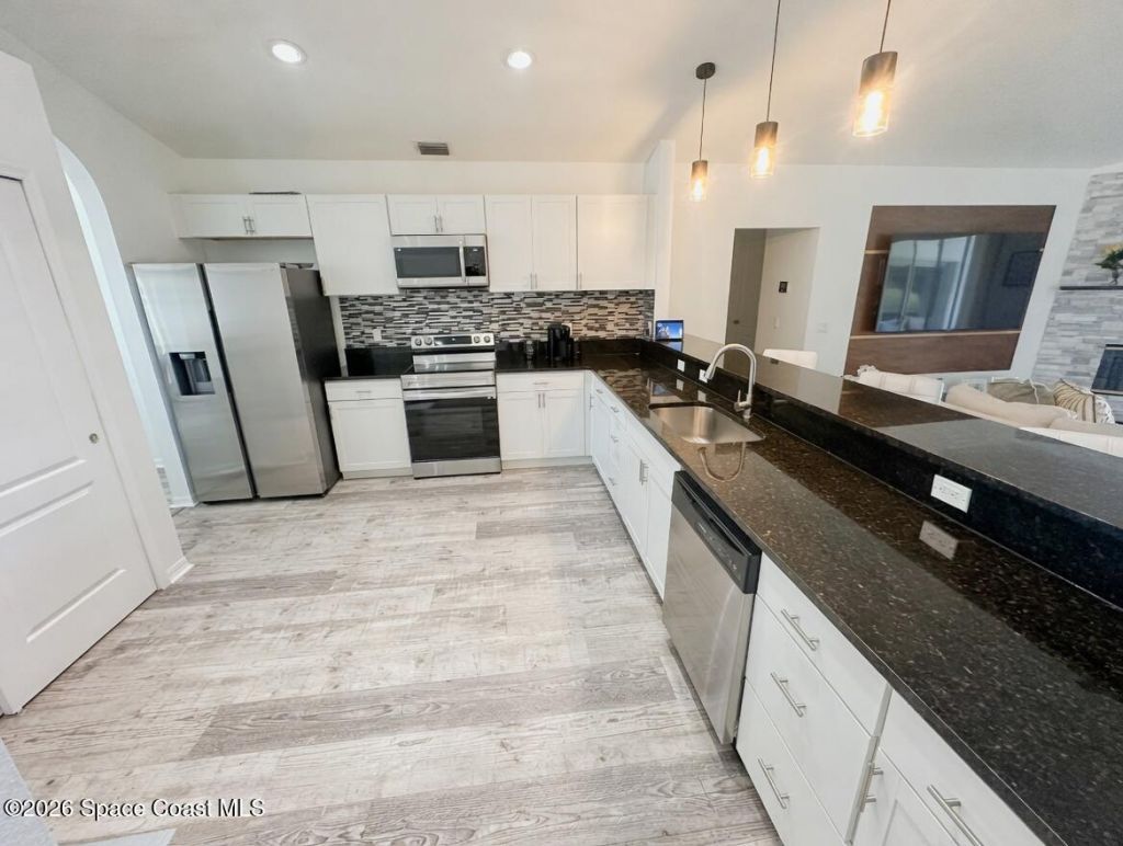 704 Carriage Hill Road, Melbourne, FL 32940 Photo