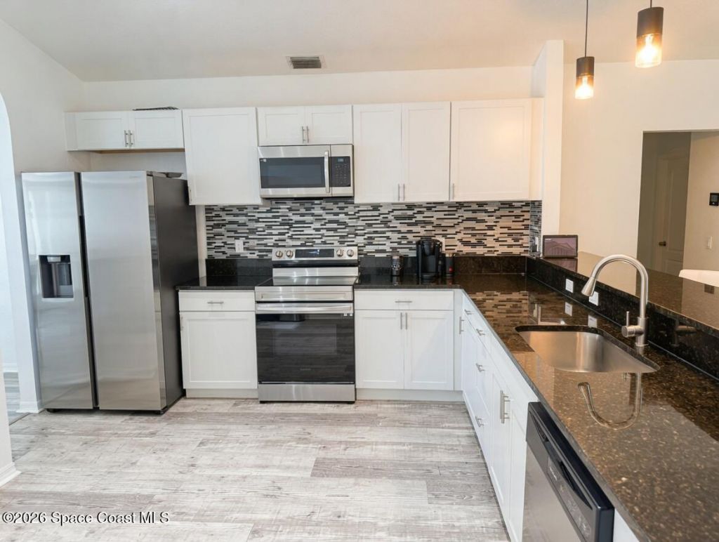 704 Carriage Hill Road, Melbourne, FL 32940 Photo