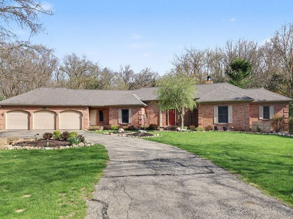 2864 Riverwoods Drive NE, Rockford, MI 49341