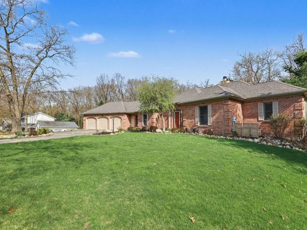 2864 Riverwoods Drive NE, Rockford, MI 49341