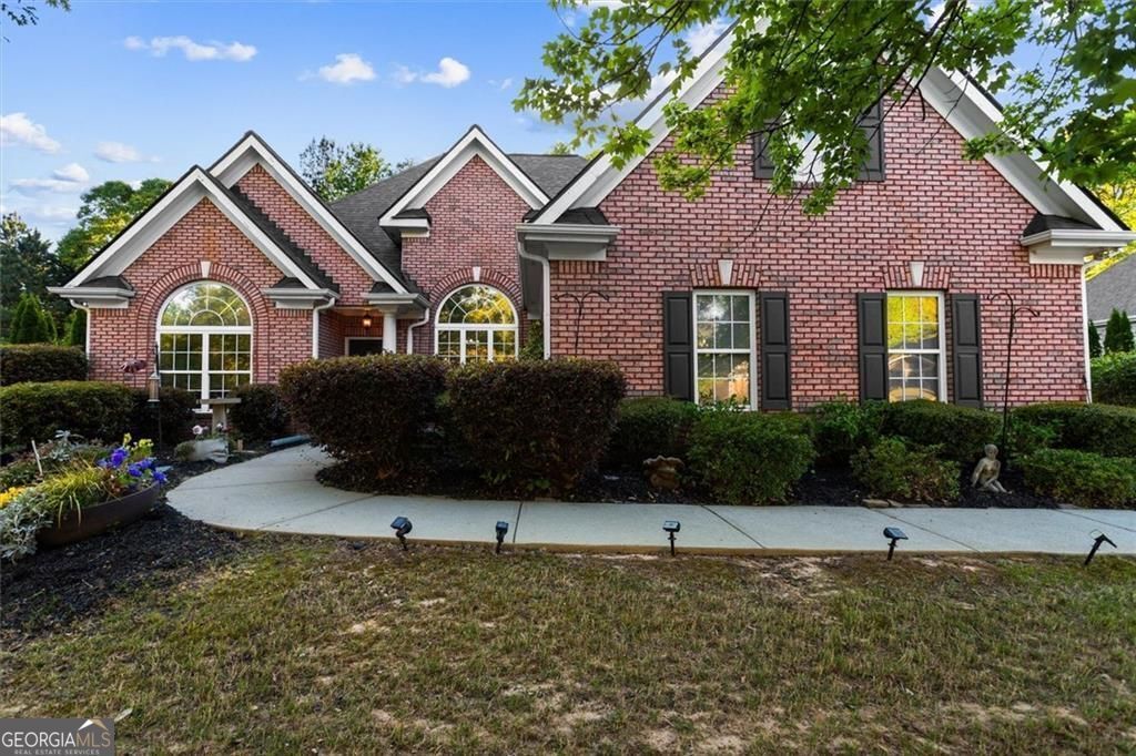 711 Ashley Wilkes Way, Loganville, GA 30052 Main Photo