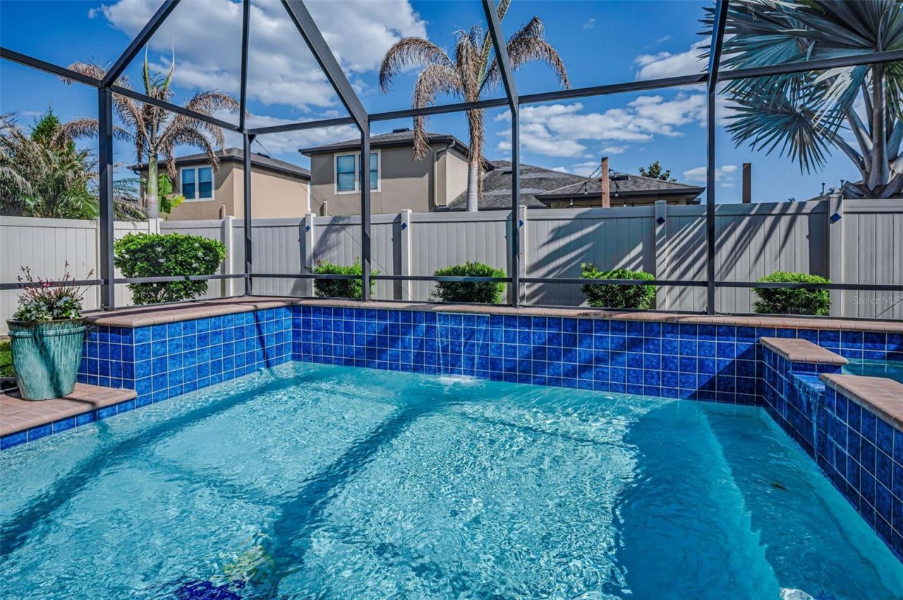 8449 Bluevine Sky Drive, Land O Lakes, FL 34637 Photo