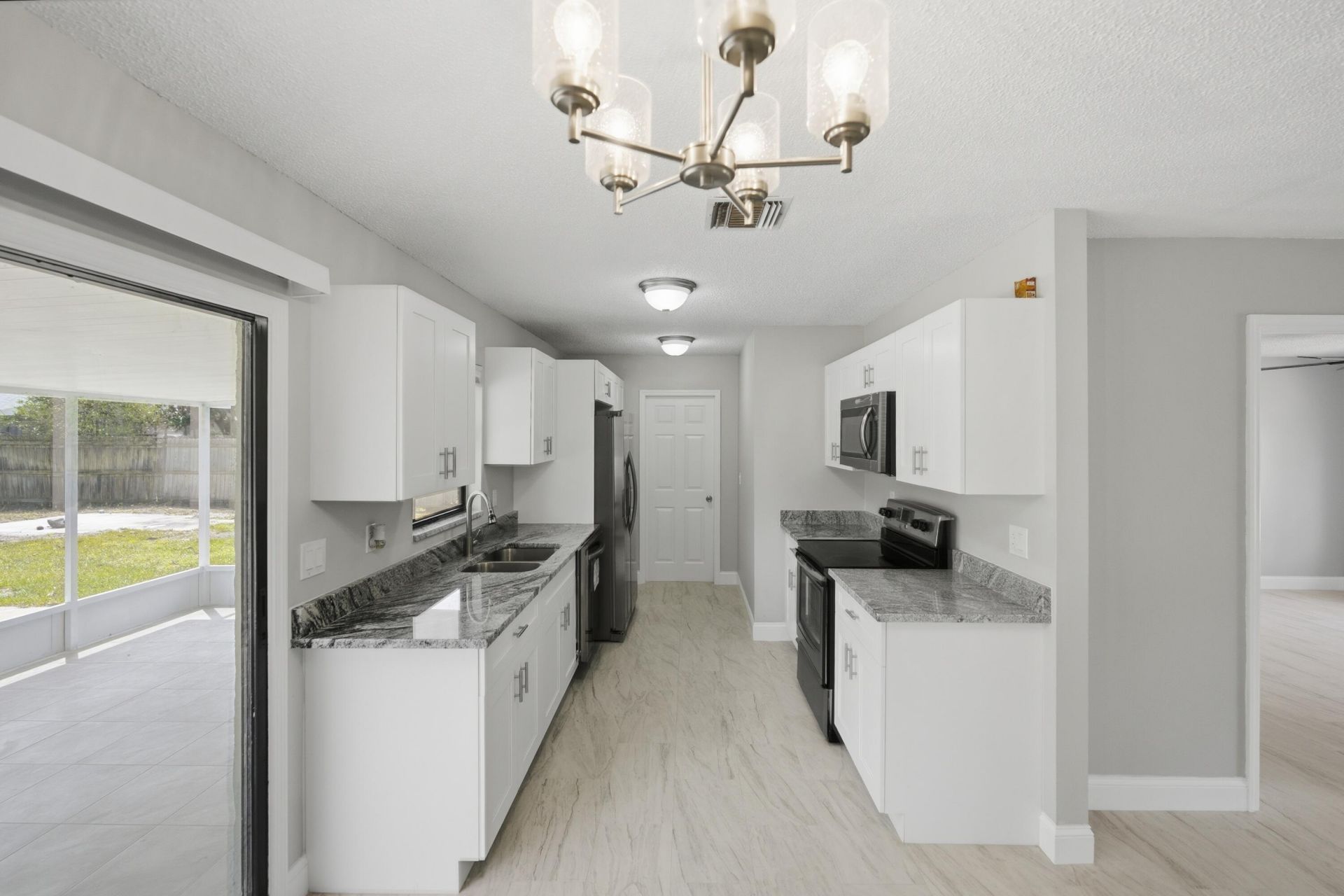 1781 SW Cloverleaf Street, Port Saint Lucie, FL 34953 Photo