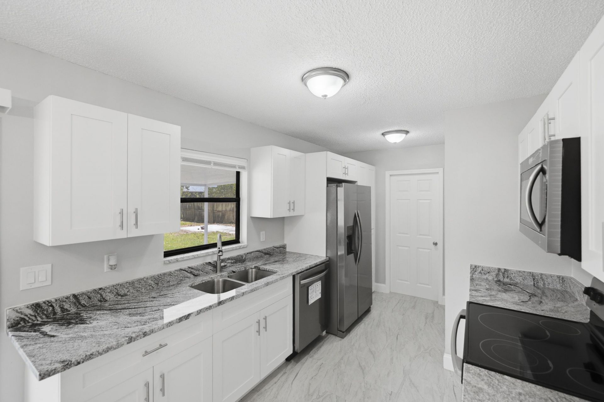 1781 SW Cloverleaf Street, Port Saint Lucie, FL 34953 Photo