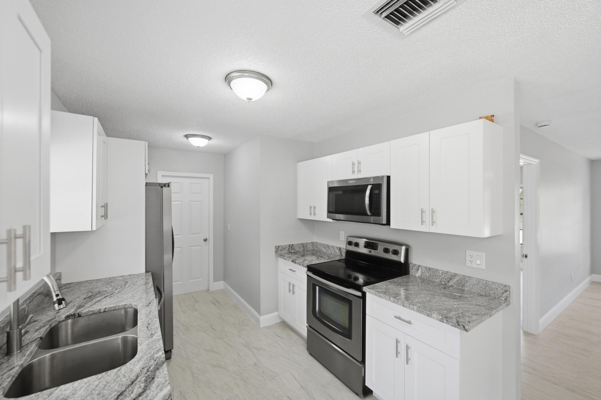 1781 SW Cloverleaf Street, Port Saint Lucie, FL 34953 Photo