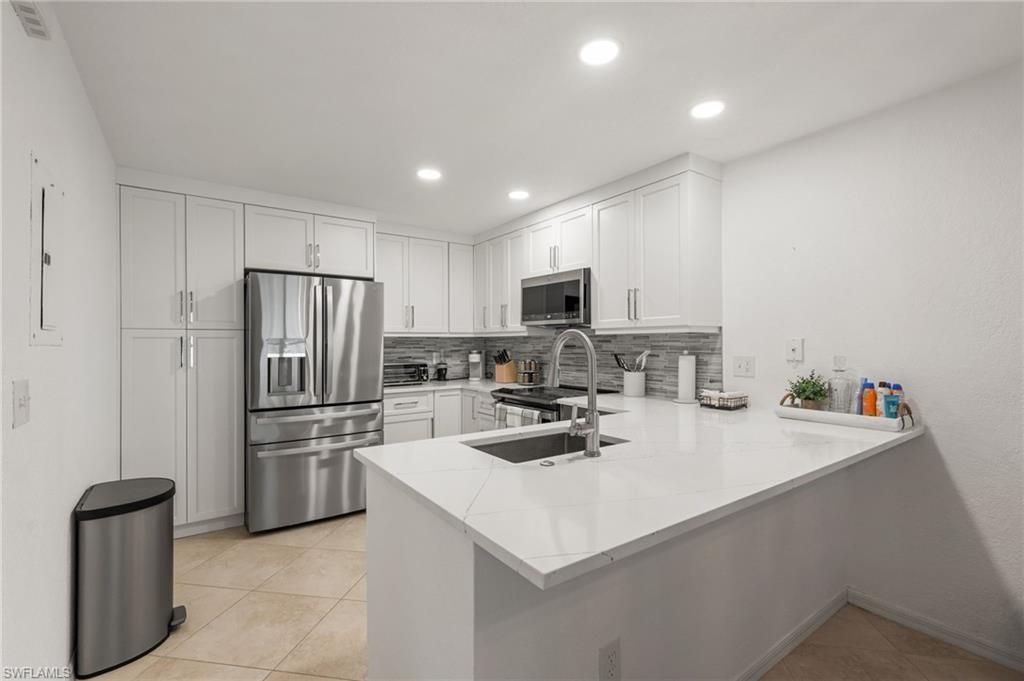 77 Emerald Woods Dr , Unit I6, Naples, FL 34108 Photo
